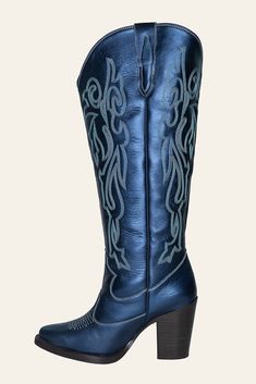 Experience sophistication with our Metallic Navy Leather Women's Wide Calf Cowboy Boots, adorned with exquisite silver and grey stitching Enjoy all-day comfort with an 18-inch calf circumference, ensuring the perfect fit for every wearer Step confidently with a fashionable 3.5-inch heel that adds a chic flair to any outfit Silver Fitted Boots With Reinforced Heel, Heeled Boots With Padded Heel And Snip Toe, Silver Leather Knee-high Boots, Western Style Formal Heeled Boots, Silver Leather Heeled Boots For Fall, Wide Calf Cowboy Boots, Wide Calf, Navy Leather, 5 Inch Heels