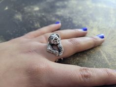 This happy silver sloth ring is adjustable to fit any finger. Hand cast from white jewelers' brass with lost-wax techniques and acid oxidized for a deep vintage finish. Free shipping in USA. B1 Adjustable Sterling Silver Skull Ring, Adjustable Handmade Silver Skull Ring, Sloth Ring, Silver Sterling Skull Ring, Oval Shaped, Vintage Hand-cast Skull Ring For Gift, Unique Hand-cast Skull Ring, Feather Ring Silver, Multiple Rings, Snake Ring Silver