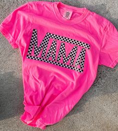 This DTF screen print checkered MAMA shirt is going to be your new favorite shirt! It is super comfy and a perfect staple for your closet! *neon pink & lagoon blue pictured.  Comfort Colors: - Unisex Sizing - Size down for smaller fit & up for larger fit - 100% ring-spun cotton Shirt colors may vary slightly.  SHIRT CARE: - Machine Wash Cold inside-out - Lay flat or hang dry - Avoid dryer at high heat Casual Plaid T-shirt With Graphic Print, Plaid Cotton Tops With Letter Print, Pink Lagoon, Silly Shirt, Casual Outfit Inspiration, Mama Tee, Trendy Tee, Trendy Shirts