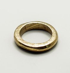 -Wide Band  -High Quality Bronze -The same can also be made in Solid 925 Sterling Silver -Or gold plated  -Hand-carved from wax -Made by hand with Love and Care in my workshop in Greece -Code: Bwide band005 -Ring width 0,5cm -Approx. 6gr Wide band B002 https://haritopoulougallery.etsy.com/listing/1780084879 Wide band B003 https://haritopoulougallery.etsy.com/listing/1780097089 Wide band B005 https://haritopoulougallery.etsy.com/listing/1780097627 Wide band B006 https://haritopoulougallery.etsy.c Minimalist Hand Forged Engraved Promise Ring, Minimalist Hand Forged Engraved Ring, Minimalist Brass Promise Rings, Minimalist Handmade Gold Engraved Ring, Minimalist Handmade Rings In Recycled Gold, Minimalist Engraved Brass Rings, Adjustable Handmade Bronze Rings, Handmade Bronze Rings For Collectors, Bronze Organic Ring