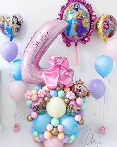 a birthday decoration with balloons and decorations