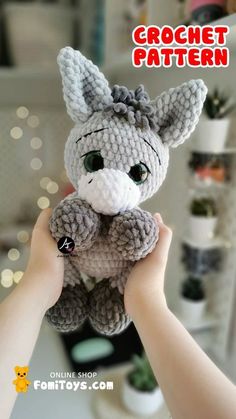 a hand holding a small stuffed animal in it's right hand with the caption crochet pattern