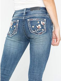 These are the must have jeans for every cowgirl. They have a light stonewash, plus a traditional button and zipper down front. The mid-rise jeans are super comfortable with an original fit and bootcut leg opening. Every cowgirl will also love the saddle stitching on the back pockets and the five pocket styling. 98% Cotton, 2% Elastane Material stretches Stone washed Bootcut leg Mid rise Floral Embroidered 5-pocket design with zipper fly and button closure 33" inseam Machine wash cold inside out, tumble dry low SIZE US JEANS WAIST HIP INCH CM INCH CM XS 2/4 23/24 25 64 34 86 S 6/8 25/26 27 69 37 94 M 10 27/28 29 74 39 99 L 12 29/30 32 81 41 106 XL 14 31/33 35 89 44 112 2XL 16 34/36 38 96 47 120 3XL 18 37/39 41 106 50 127 Must Have Jeans, Jean Embroidery, Fly Boots, Denim Embroidery, Floral Pocket, Painted Clothes, Jeans Bootcut, Embroidery Ideas, Clothes Ideas