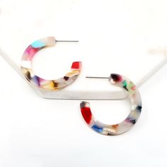 "❤️Bauble Sky PROMOTION❤️ ▪️Buy 1 Get 10% OFF ▪️Free Shipping Over $35 (USA domestic only) [ Circle Acetate Fashion Hoop Earrings] : simple & modern multi colored resin in push back earrings. We offer 2 sizes of the hoop. This lightweight earring is simple and modern, but stylish. Bauble Sky modern earring is a Must-have Item for your Special Day and Everyday! With it, You will look more charming and attractive. ♥Size Options [Large]: 2\" (50mm) [Small]: 1 1/8\" (30mm) ♥Color Option [MULTI]: Trendy Small Hoop Plastic Earrings, Trendy Small Hoop Resin Earrings, Modern Plastic Hoop Earrings For Gifts, Modern Plastic Hoop Earrings As Gift, Lucite Hoop Earrings As Gift, Trendy Acetate Earrings For Gifts, Plastic Hoop Earrings For Gifts, Plastic Hoop Earrings As Gift, Plastic Hoop Earrings Gift