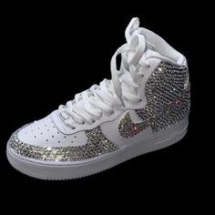 Welcome, Nike Airforce 1’s High Tops With Luxe Crystal & Crystal Ab Bling Ticks Fronts & Back Design, Made To Last Permanent Design! Colours:Iridescent Crystal Diamond & Crystal Iridescent Ab All Colours Available Please See Colour Chart Attached, Brand New In Box Nike Airforce 1’s High Tops Sizes In Usa Women’s 6 6.5 7 7.5 8 8.5 9 9.5 10 10.5 11 11.5 12 12.5 13 Comes With Original & Ribbon Laces To Order; Can Also Be Made In Black Please See Colour Chart Attached To Change Colour Way Or Add Add White High-top Sneakers With Glitter Accents, White Synthetic Sneakers With Bling, White Iced Out Sneakers For Streetwear, White Embellished Sneakers For Streetwear, White Custom Sneakers With Bling, Round Toe, White Low-top Custom Sneakers With Bling, White Custom Sneakers With Rhinestones For Streetwear, White Custom Rhinestone Sneakers For Streetwear, White Rhinestone Custom Sneakers For Streetwear