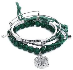 three bracelets with green beads and a silver charm that says,'slytherin '