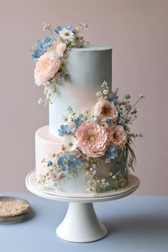 Baby blue and blush pink floral wedding cake    Baby blue wedding | pale blue wedding | blush pink wedding | dusty rose wedding | baby blue and blush pink wedding | blue and pink wedding | blue and pink wedding cake | floral wedding cake | spring wedding cake | pastel wedding cake | pink wedding cake | blue wedding cake Blue Rose Wedding Cake, Light Blue And Pink Wedding Cake, Light Blue And Dusty Rose Wedding, Wedding Cakes Pink And Blue, Pink And Light Blue Wedding Theme, Dusty Pink And Blue Wedding Theme, Dusty Blue And Pale Pink Wedding, Powder Blue And Blush Pink Wedding, Wedding Cake Pastel Colours