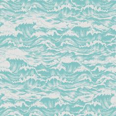 a blue and white wallpaper with waves on it