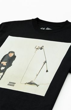 The Jack Harlow Cover Oversized T-Shirt is a must-have for fans of the artist. This shirt features a crew neckline, short sleeves, an oversized fit, and a design inspired by Jack Harlow's "Come Home The Kids Miss You" album cover, making it a stylish and iconic way to show your support for his music.


	Crew neckline
	Short sleeves
	Oversized fit
	Album cover art graphic
	Machine washable Oversized Black Graphic Design Tops, Jack Harlow Tshirt, Oversized Black Printed T-shirt, Oversized Black T-shirt With Character Print, Oversized Black T-shirt With Front And Back Print, Jack Harlow, Album Cover Art, Oversized T Shirt, Come Home