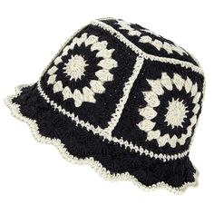 a black and white crocheted hat on a white background