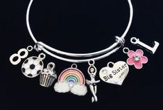 Use this link if you would like to add Birthstones to this bracelet ~ https://www.etsy.com/listing/774404837Little Girl Size adjustable bracelet normally fits children 8 -13 years old (estimation). (This is the Medium Size)Expandable and Completely Adjustable. Medium Size pictured is 4 1/2 inches.  Can be adjusted as small as needed by Gently squeezing the bracelet smaller.  This Medium sized Child bracelet will expand to fit up to a 6 inch wrist.  Stainless Steel Split rings attach charms to ba Cheap Adjustable Charm Bracelet For Birthday, Cute Bangle Jewelry For Birthday, Cute Bangle For Birthday, Cute Birthday Bangle Jewelry, Fun Adjustable Jewelry For Birthday Gift, Adjustable Fun Jewelry For Birthday Gift, Fun Birthday Jewelry Bracelet, Fun Birthday Bracelet Jewelry, Fun Personalized Charm Bracelet For Birthday