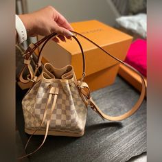 Authentic Includes: Original Box & Dustbag, Authentic Leather Top Handle Strap And String Tab (As Pictured) Save On Taxes & Add Ons. Brand New Never Worn!! Make An Offer Louis Vuitton Noe Bb, Add Ons, Leather Top, Louis Vuitton Bag, Top Handle, Original Box, Dust Bag, Bag Lady, Louis Vuitton