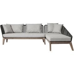 two couches with pillows on them and one is made out of wood, the other has