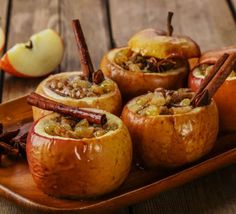 apples with cinnamon and apple slices on a plate