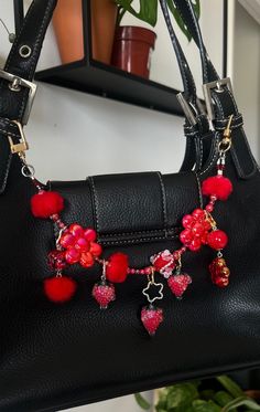 You don't need a new bag, you just need to charm! I created these chains to freshen up your old and new accessories, to personalize them and make them more unique to you!  Chain Length approx: 12" + 5 handmade charms Colors: red, gold, silver Materials, Metal, handcrafted beads, plastic beads Collection: Strawberry Dew  Bag chains are not meant to hold weight but to decorate your accessories Cute Bag Charms, Bag Charms Diy, Bag With Charms, Diy Bag Charm, Strawberry Bag, Seed Bead Crafts, Fashion Accessories Trends, Accessorize Bags, Beads Collection