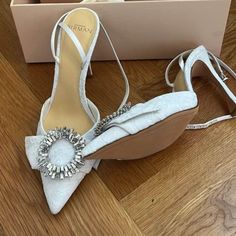 Elegant And Beautiful Pumps. Detailed With Subtle Lace And A Stunning Embellishment. Curved Heel To Add More Comfort And Support. Originally Priced At 650$ Asking 160 Or Best Offer. Never Worn, Brand New With Box And Duster Bag. Initially Bought For My Wedding And They Didn’t Match My Dress. Size 37 Eu Chic Embellished Wedding Shoes For Gala, Chic White Embellished Wedding Shoes, White Rhinestone Shoe Clips, Elegant Embellished Ankle Strap Wedding Shoes, Chic Wedding Shoes With Rhinestones, Chic Embellished Wedding Shoes, Embellished Pointed Toe Heels For Party, Chic Embellished High Heel Wedding Shoes, Glamorous Crystal Embellished Shoe Clips