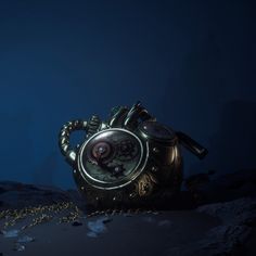 an old clock sitting on top of a rock next to a chain and light bulb