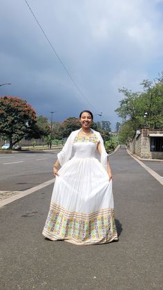 Immerse yourself in the intricate splendor of our handwoven Habesha dress, a true testament to Ethiopian craftsmanship. This remarkable dress features a captivating detailed pattern that showcases the rich heritage and artistic expression of Ethiopian design. The detailed pattern, meticulously crafted using thread, brings an air of sophistication and elegance to the dress. Each intricately woven motif reflects the essence of Ethiopian cultural traditions and symbols, making this dress a represen Habesha Dress Modern, Habesha Dress, Cultural Traditions, Habesha Kemis, Dress Modern, Wedding Dress Chiffon, Dresses Chiffon, Modern Dress, Artistic Expression