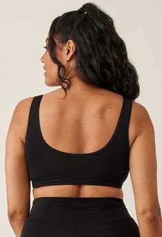 This incredibly soft nursing bra has become a customer favorite, and there's no wonder why. Its unparalleled comfort and flexibility make it a top choice before, during, and after pregnancy. The cups boast a double layer of material, and with the wrap cut, nursing becomes effortlessly easy. The clean design, free from chafing fasteners, combined with the cool and moisture-absorbing material, makes it ideal for night nursing. It's simply the ultimate bra—your go-to, every day of the week, 24 hour Supportive Full Coverage Nursing Bra For Loungewear, Supportive Nursing Friendly Sports Bra, Stretch Nursing-friendly Bra, Supportive Nursing Bra With Soft Touch, Full Coverage Nursing Bra For Loungewear, Supportive Black Nursing Bra With Medium Bust Support, Everyday Fitted Nursing Bra With Soft Touch, Scoop Neck Bra With Medium Bust Support, Black Seamless Full Coverage Nursing Bra