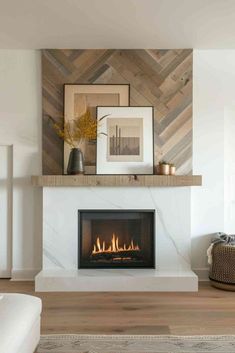 a white fireplace with wood paneling and a fire place