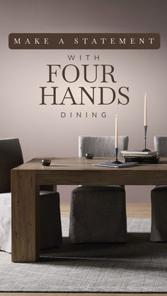 a dining room table with four chairs and a candle on the table next to it