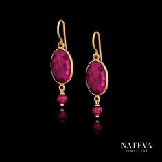 Gold-plated silver 925 earrings, each set with a stunning ruby stone. Their deep colour and texture, enhanced by the gold plating, make them a unique and luxurious addition to any jewellery collection. The earrings also feature a smaller round ruby bead set under each Ruby stone, adding an extra touch of elegance. Materials: 925 Silver Gold Plating Ruby Size (approx.): 39 mm length, 15x10 mm gemstone Please note: This photo is for illustrative purposes only, each piece of jewellery is uniquely one-of-a-kind and made to order therefore the size, texture and forms will slightly vary. CARING FOR SILVER Silver jewellery will naturally tarnish (oxidise) over time depending on exposure to extreme temperatures, humidity, sunlight, chemicals and other factors. Tarnishing is a dulling which natural Gold Faceted Ruby Earrings, Luxury Ruby Gemstone Earrings, Luxury Hallmarked Ruby Earrings, Gold Ruby Gemstone Earrings, Gold Earrings With Ruby Gemstone, Gold Ruby Earrings With Gemstone, 925 Earrings, Clear Nail Polish, Ruby Beads