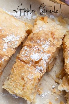 slices of apple strudel on parchment paper. Apfelstrudel Recipe, German Apple Strudel Recipe, German Apple Strudel, Easy Apple Strudel Recipe, Easy Apple Strudel, Apple Strudel Recipe, Strudel Recipes, Sunday Morning Breakfast