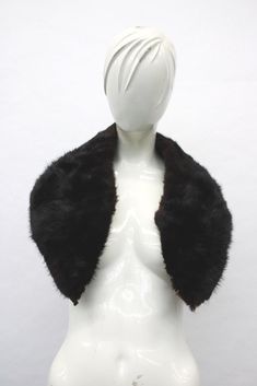 "DESCRIPTION: BEAUTIFUL AND VERY STYLISH BLACK/BROWN MUSKRAT FUR WING/SHAWL COLLAR FOR WOMEN! IT CAN BE WORN WITH A WINTER COAT.  THIS ITEM IS PRE-OWNED: THE FUR AND THE LINING ARE \"MINT\", THE SECOND BEST CONDITION POSSIBLE! MEASUREMENT: SIZE: 8\" X 40\" (MEASURED ON THE EDGE OF THE NECK SIDE) a10327 Oliverfurs 9250 Parc Ave. #204, Montreal, Quebec, H2N 1Z2, Canada www.oliverfurswholesale.com oliver@oliverfurswholesale.com Toll free: 1-866-845-9997 International: 1-514-845-9997" Chinchilla Fur Coat, Raccoon Fur Coat, Fur Mitten, Mongolian Lamb, Chinchilla Fur, Bib Collar, Mink Fur Coat, Sheepskin Jacket, Collars For Women