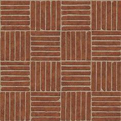 a brown rug with squares and lines on it