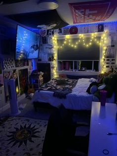 a bed room with a neatly made bed and lots of lights