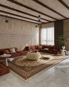 a living room filled with lots of furniture next to a large rug on the floor