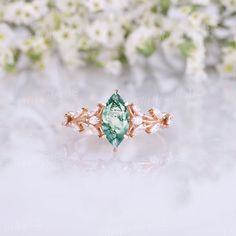 Vintage moss agate engagement ring marquise cut green gemstone 14k rose gold wedding ring marquise moissanite cluster branch ring for women RING DETAILS METAL: available in 14k or 18k solid yellow gold, white gold, rose gold ( Please contact me directly for palladium or platinum.) ENGAGEMENT RING CENTER STONE: Moss agate SIZE: 5X10mm SHAPE: Marquise-shaped ACCENT STONES: Moissanite SHAPE: Marquise shaped About 0.45ct Or side stone by Diamond: 0.45ct Clarity - SI-VS Color- G-H Bandwidth - 1.5mm V Moss Agate Marquise Engagement Ring, Fine Jewelry Marquise Rose Gold, Fine Jewelry In Rose Gold Marquise Shape, Fine Jewelry In Rose Gold Marquise Style, Fine Jewelry Rose Gold Marquise, Emerald Jewelry With Marquise Cut Center Stone, Moissanite Jewelry With Marquise Cut And Accent Stones, Dainty Marquise Gemstone Jewelry, Marquise Emerald Jewelry In White Gold