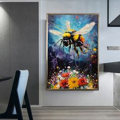 a painting of a bee is hanging on the wall