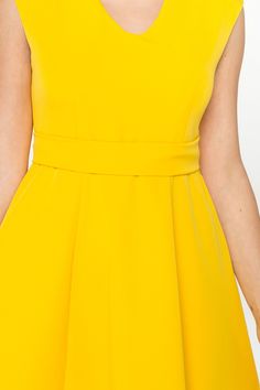 "A cocktail dress featuring a fit and flare silhouette, midi length and cap sleeves. - fit and flare silhouette - round v neck - knee length (midi) - cap sleeves - fabric belt - lined bodice - concealed zipper in side seam - perfect viscose fabric (comfortable and soft to touch) - Color: yellow Fiber: 60% viscose, 35% polyester, 5% elastane, lining - 95 % viscose, 5 % elastane. For size S:dress length- 40,0 \" (102 cm) Our model wears size S (US 6) and is 171cm/5'6\" tall You may feel free choos Fit And Flare A-line Tea Length Dress For Cocktail, A-line Midi Dress For Wedding Guest, A-line Dress For Wedding Guest, A-line Dresses For Wedding Guests, Summer A-line Tea Length Bridesmaid Dress, A-line Sleeveless Dress For Bridesmaids, Elegant Cap Sleeve Mini Dress For Summer, Fitted A-line Midi Dress For Wedding Guests, Wedding Guest A-line Midi Dress With Fitted Bodice