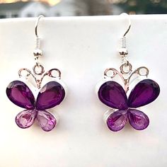 Light And Dark Purple Gems On Silver Drop Butterfly Earrings! Fishhook Styling. Manmade Gems. Measures 7/8 Inch Tall And 3/4 Inch Wide. New From Package. Also Available In Pink Sold Separately In My Closet. All Measurements Are Approximate. Purple Metal Crystal Earrings As Gift, Purple Crystal Metal Earrings For Gifts, Purple Metal Crystal Earrings For Gift, Adjustable Silver Crystal Earrings As Gift, Gem Butterfly, Jewelry Purple, Purple Gems, Purple Butterfly, Butterfly Earrings