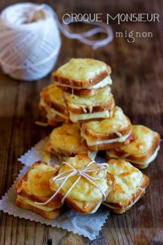 croque monsieur minion cookies are stacked on top of each other and tied with twine