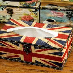 three boxes with british flags painted on them