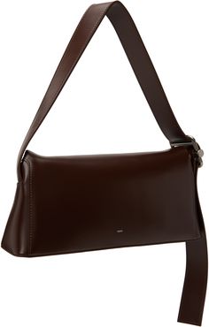 Buffed leather shoulder bag in brown. · Adjustable shoulder strap · Logo stamp at back face · Hinged foldover closure · Patch pocket at interior · Cotton canvas lining · Logo-engraved silver-tone hardware · H5.5 x W11.75 x D3 Supplier color: Choco brown Silver Engraving, Logo Stamp, Patch Pocket, Leather Shoulder Bag, Cotton Canvas, Silver Tone, Shoulder Strap, Stamp, Shoulder Bag