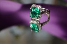 Beautiful Muzo green lab grown Emerald ring! May birthstone ring, accept custom order.   I currently have one that's ready to ship, below are specs, Priced at $880. Main Stone: 3.75ct Lab grown Emerald (feel free to change to ruby, sapphire, tourmaline, and more. Just send me a message to personalize) Shape: Emerald Color: Muzo green Side stone: Diamond CZ 2.5ct Metal: 9K gold (AU375)   ( 14K gold (AU585) or 18K gold (AU750) also available for personalized order)  Metal tone: White (gold and ros May Birthstone Rings, Green Side, Emerald Color, May Birthstone, Ruby Sapphire, Emerald Ring, Birthstone Ring, Rings Statement, Lab Grown