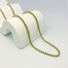 This trendy chain necklace is the perfect way to add a touch of personality to your look. The unique box chain design is both stylish and modern, and the versatile length makes it easy to wear with any outfit. Layer it with other necklaces for a more personalized look, or wear it alone for a minimalist statement.Available in gold and silver. Trendy Delicate Snake Chain Necklace Gift, Trendy Adjustable Snake Chain Necklace As Gift, Trendy Adjustable Snake Chain Necklace For Gift, Modern Gold Necklace With Rolo Chain, Trendy Gold Box Chain Necklace, Yellow Gold Box Chain Necklace, Rectangular Box Chain Necklace In Metal, Metal Chain Necklace With Box Chain Links, Metal Link Chain Necklace With Box Chain