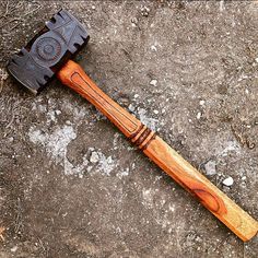 an old hammer laying on the ground