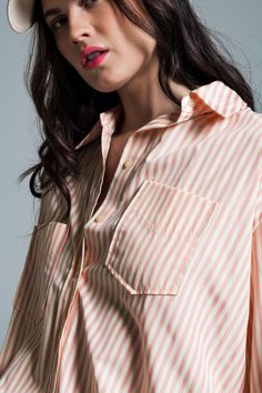 Discover the effortless charm of our Light Orange Oversized Blouse, adorned with crisp white stripes, a must-have addition to your summer collection. Breathable Fabric Composition: Crafted from 100% Polyester, this blouse ensures both durability and comfort, perfect for warm summer days. Eye-Catching Design: Featuring a striking light orange hue complemented by elegant white stripes, this blouse stands out with its refreshing color palette. Versatile Oversized Fit: Designed to run big with an ov Oversized Summer Shirt With Striped Collar, Striped Collared Blouse Relaxed Fit, Striped Collared Blouse With Relaxed Fit, Relaxed Fit Striped Collared Blouse, Oversized Striped Collared Blouse, Chic Vertical Stripes Blouse For Spring, Spring Oversized Blouse With Striped Collar, Chic Spring Blouse With Vertical Stripes, Oversized Blouse With Striped Collar For Spring