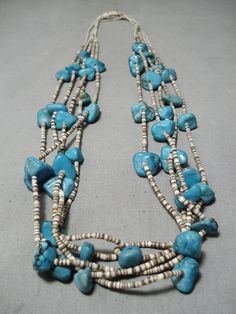 MAKE US AN OFFER BY CLICKING THE "MESSAGE SELLER" Button- Here we have an exceptional vintage Navajo necklace having 5 strands of Old Kingman turquoise stones with light brown heishi in between on a handwoven cord!  Very Impressive!  The largest turquoise stone measures about 3/4" x 5/8". The length of the necklace measures around 28". Sturdy 122 grams.  Make Us an Offer- Due to the high demand of our items, many pieces sell quite fast. The most frequent email we receive are from buyers who wait Silver Leaf Bracelet, Navajo Necklace, Hammered Bracelet, Heishi Necklace, Coral Bracelet, Leaf Bracelet, Cameo Necklace, Turquoise Stones, Kingman Turquoise