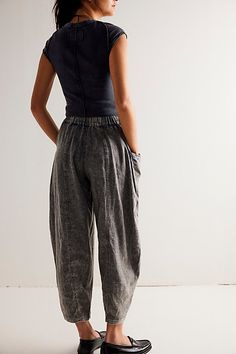 The definition of effortless, these pull-on pants will be your go-to from this season to the next. **Fit:** Mid-rise, tapered barrel silhouette **Features:** Pull-on design, dropped pouch pockets, washed dye fabrication, ankle-length inseam **Why We ❤ It:** Beachy with simple sandals or toughened-up with moto boots, this pair has endless ways to wear. | High Road Pull-On Barrel Pants by Free People in Green, Size: S Puddle Pants Shoes, Barrel Pants, Dried Basil, Simple Sandals, High Road, Pants Boot, Top Graphic Tees, Moto Boots, Bottom Clothes