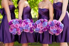 three bridesmaids in purple dresses holding bouquets