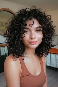 Curly haircuts are all about celebrating your texture and finding a style that complements your face shape. Whether you have loose waves, bouncy spirals, or tight coils, there’s a curly haircut out there that will Natural Curly Hair Short Haircuts, Low Maintenance Haircut Curly Hair, Short Curly Haircuts Round Face Women, Curly Haircut Square Face, Short Curly Haircuts Oval Face, Short Curly Haircuts For Oval Faces, Curly Hair Heart Shaped Face, Shirt Curly Haircut