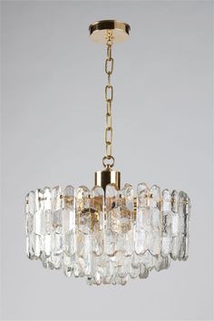 Elevate your space with the elegant Kalmar Palazzo Glass Chandelier. Handcrafted with precision, this exquisite piece features stunning glass detailing that creates a luxurious ambiance. With its timeless design and expert craftsmanship, this chandelier will add a touch of sophistication to any room. Custom Light Fixtures, Statement Chandeliers, Ring Chandelier, Lighting Companies, Elegant Interiors, Luminaire Design, Vintage Chandelier, Lamps Ceiling, Unique Lighting