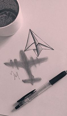 a drawing of a paper airplane and a cup of coffee