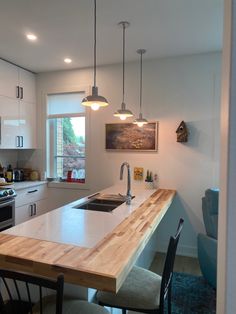 Butcher block wraparound countertop extension for added workspace and seating. Stone And Butcher Block Countertop, Granite And Butcher Block Countertops, Butcher Block And Granite Countertops, Quartz And Butcher Block Countertops, Butcher Block And Quartz Countertops, Kitchen Countertop Extension, Counter Extension, Visualization Manifestation, Kitchen Butcher Block