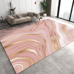 a living room with a couch, chair and rug in pink and gold marble pattern